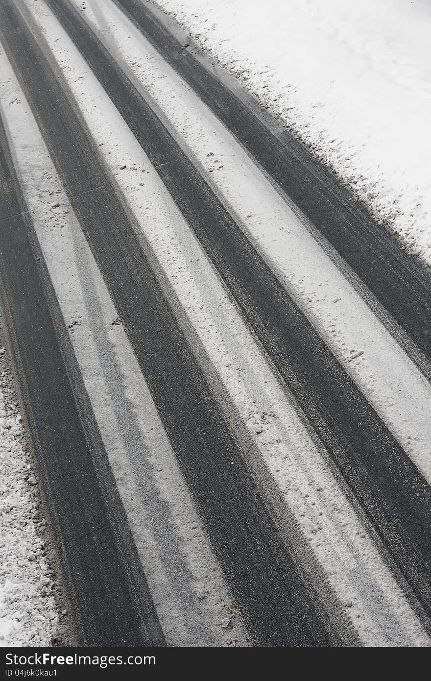 Traces of cars on a snowy road. Traces of cars on a snowy road.