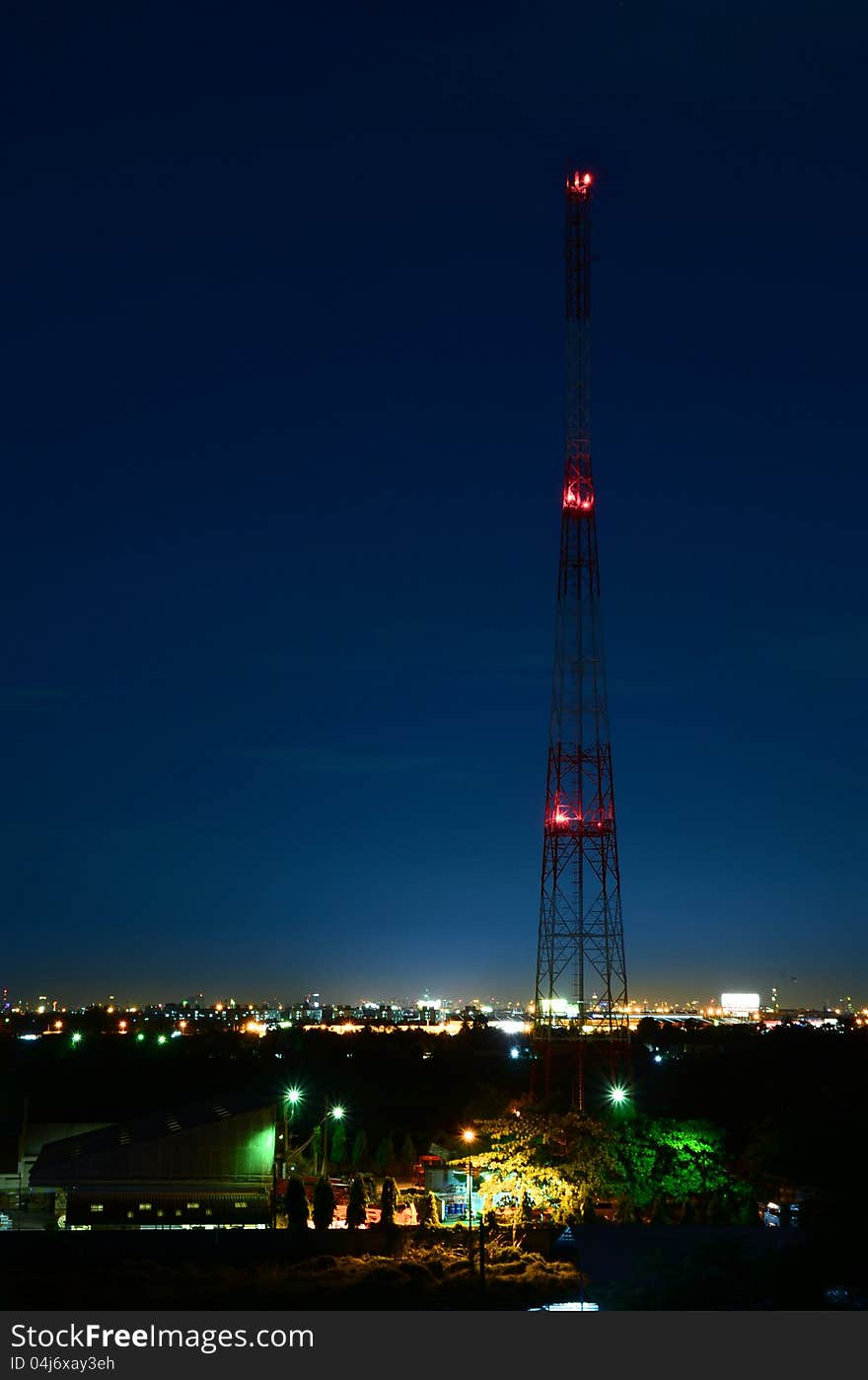 Telecom antennas at night sky
