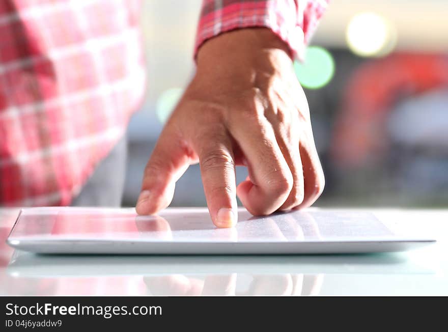 Man using digital tablet, Close-up