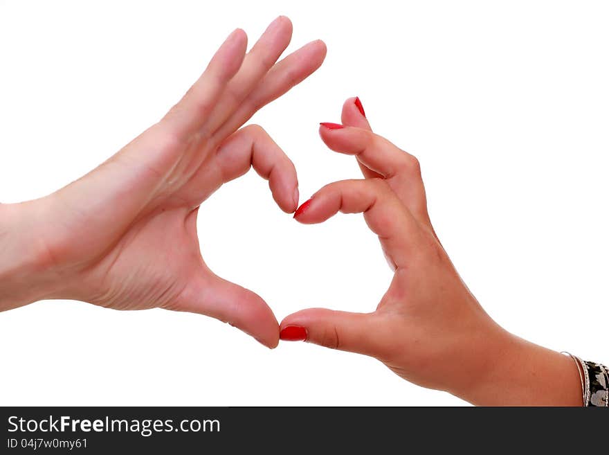 Women's and men's hands gesturing heart sign together isolated on white background. Women's and men's hands gesturing heart sign together isolated on white background