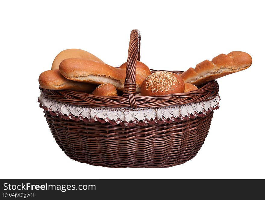 Arrangement of bread in basket isolated on white background