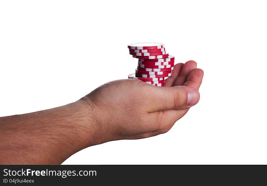 Red poker chips on the hand isolated on white