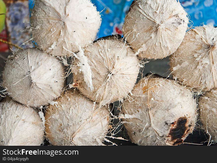 A PILE OF VERY DELICIOUS BURNT COCONUTS