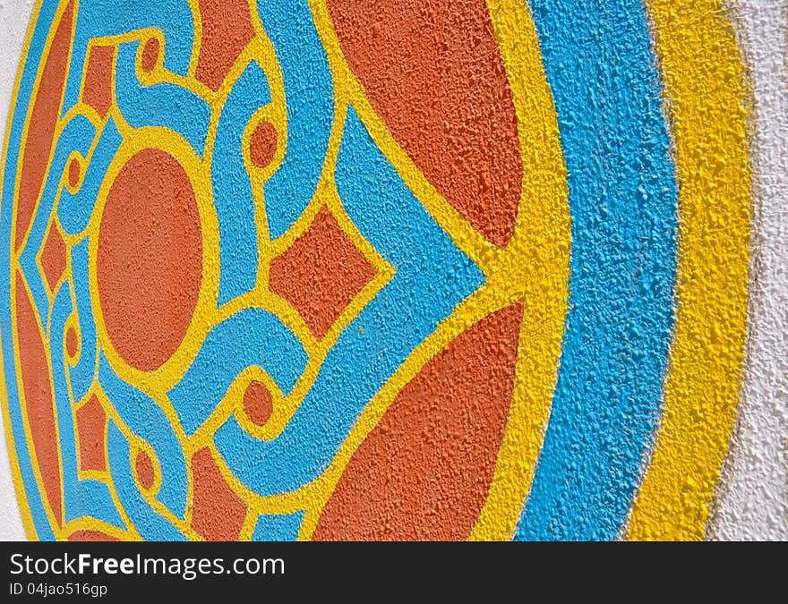 Islamic pattern painted on a textured wall and photographed from the side. Islamic pattern painted on a textured wall and photographed from the side