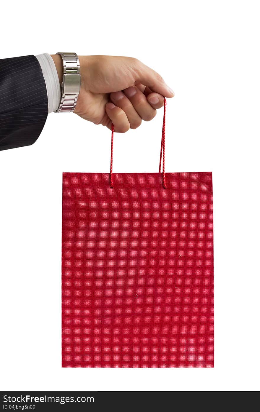 Businessman holding red gift bag