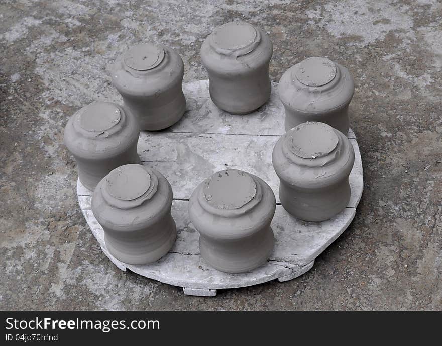 Ceramic vases on the sun in the manufacture coutyard in Fes