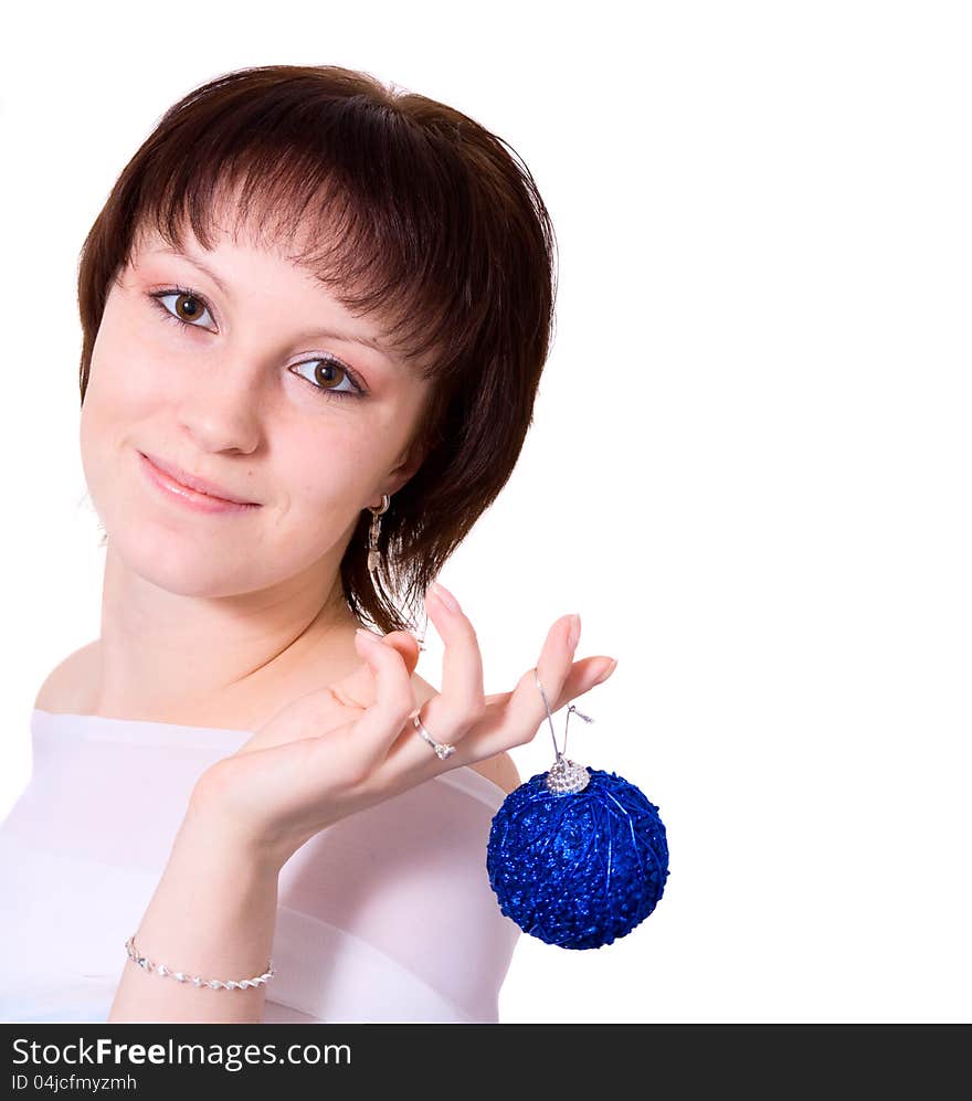 A smiling girl holding a new year's eve ball. Isolated on white background. A smiling girl holding a new year's eve ball. Isolated on white background