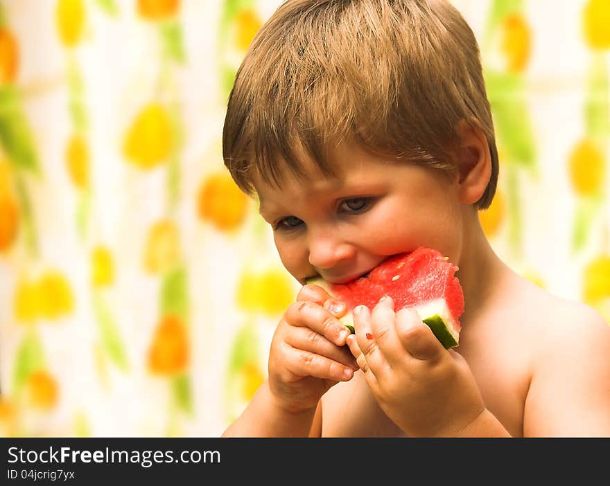 Boy Eating A Watermelon