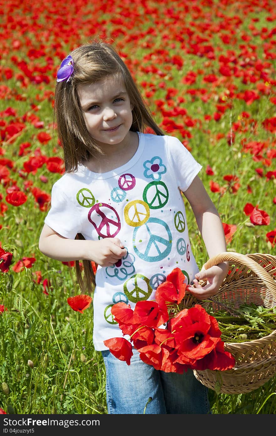 Girl on a poppy field