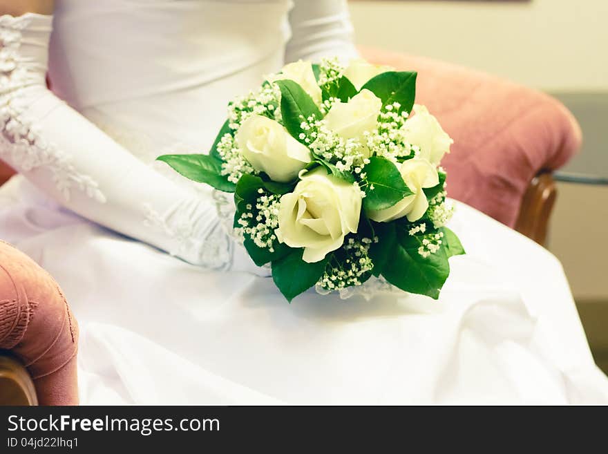 Beautiful bouquet of the bride executed from light beige roses. Beautiful bouquet of the bride executed from light beige roses