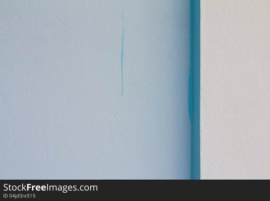 Blue in the details of the concrete wall.