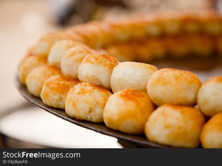 Collection of india (chaat) fried potato cutlets on bit frying pan (tava). Collection of india (chaat) fried potato cutlets on bit frying pan (tava)