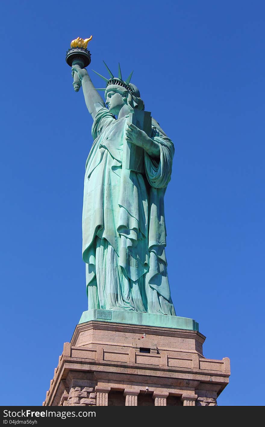 Statue Colossal de la liberte, such is the name wrote on the plaque at the base of the Statue of Liberty. Statue Colossal de la liberte, such is the name wrote on the plaque at the base of the Statue of Liberty