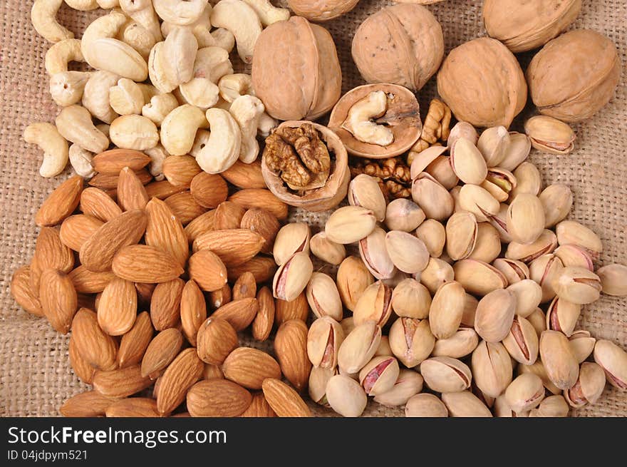 Assorted nuts (almonds, pistachio, walnuts, cashews) close up