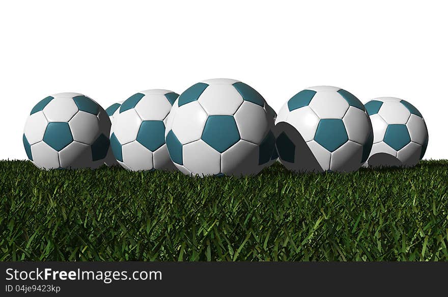 Cyan soccer balls on a green grass