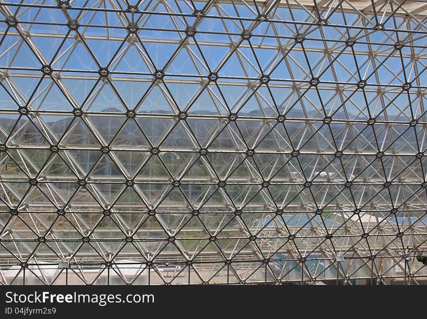 View out through the wall of a large greenhouse near Tucson, Arizona. View out through the wall of a large greenhouse near Tucson, Arizona.