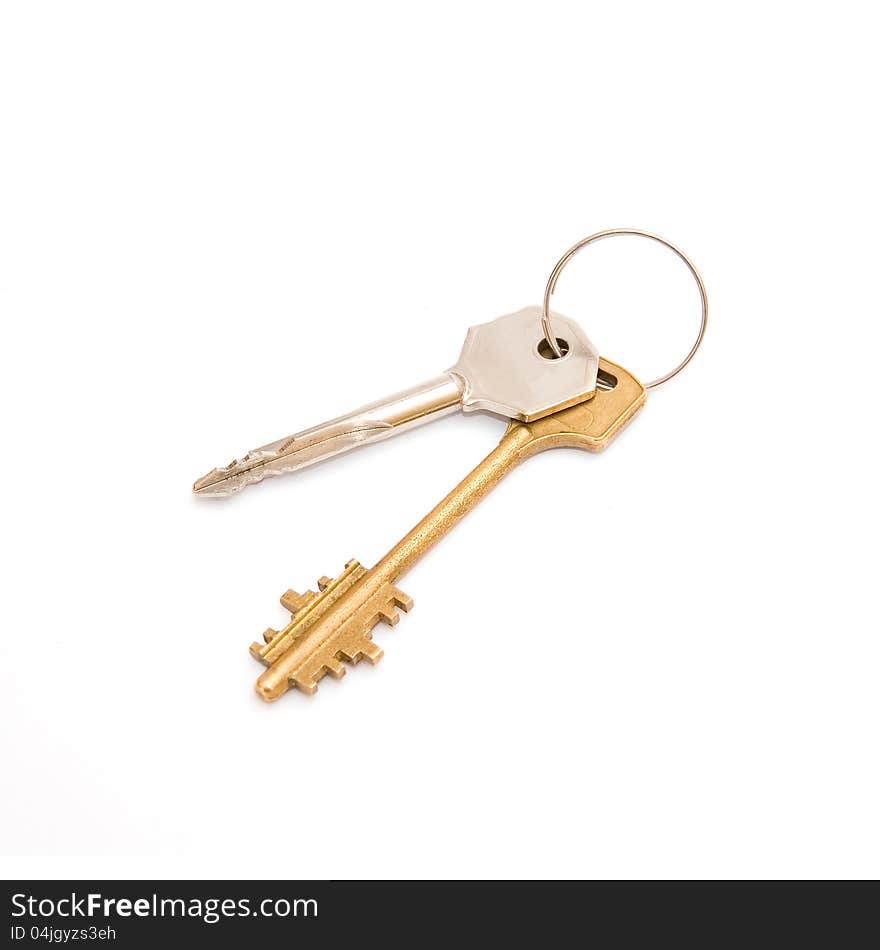 Pair of door keys on white background