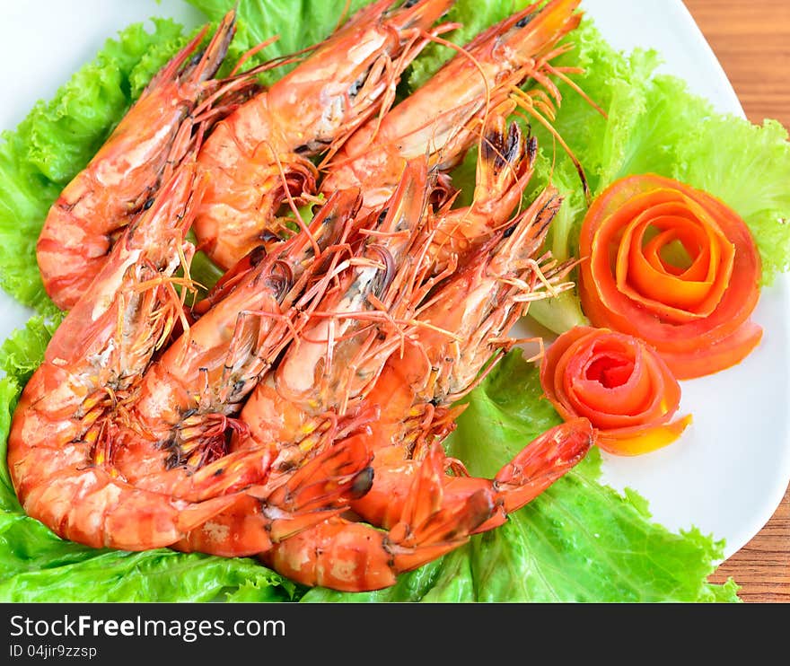 Fresh grilled shrimps with green dish