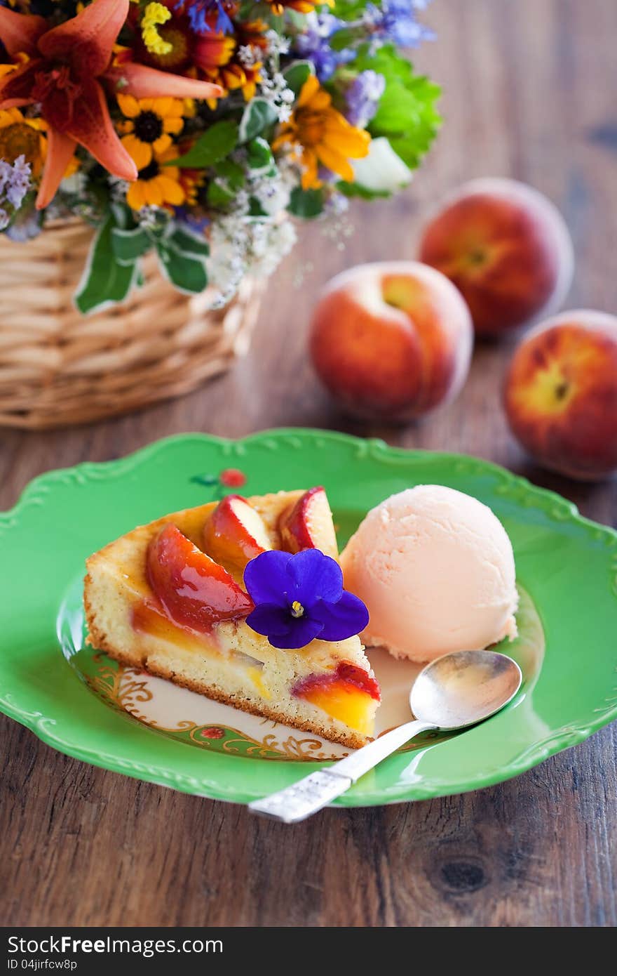 Peach pie with ice cream, selective focus