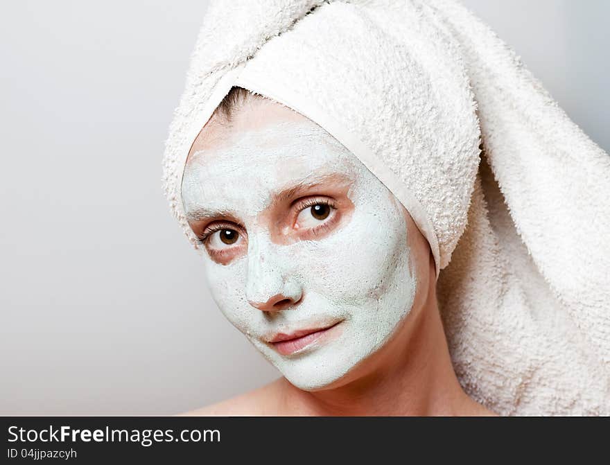 Green Spa Facial Mask on woman face