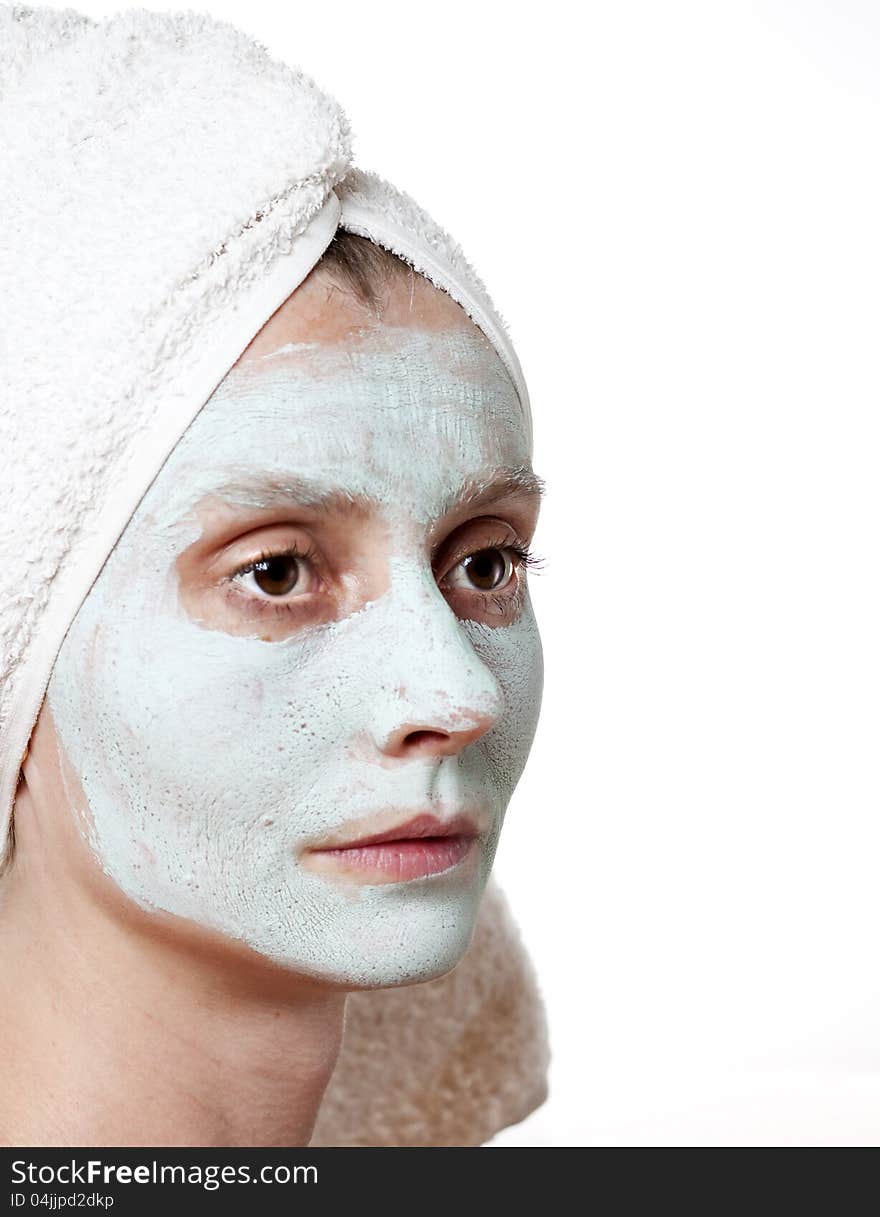 Green Spa Facial Mask on woman face