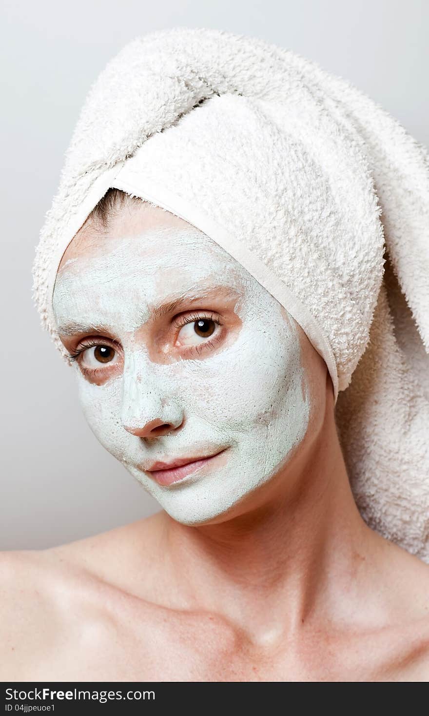 Green Spa Facial Mask on woman face