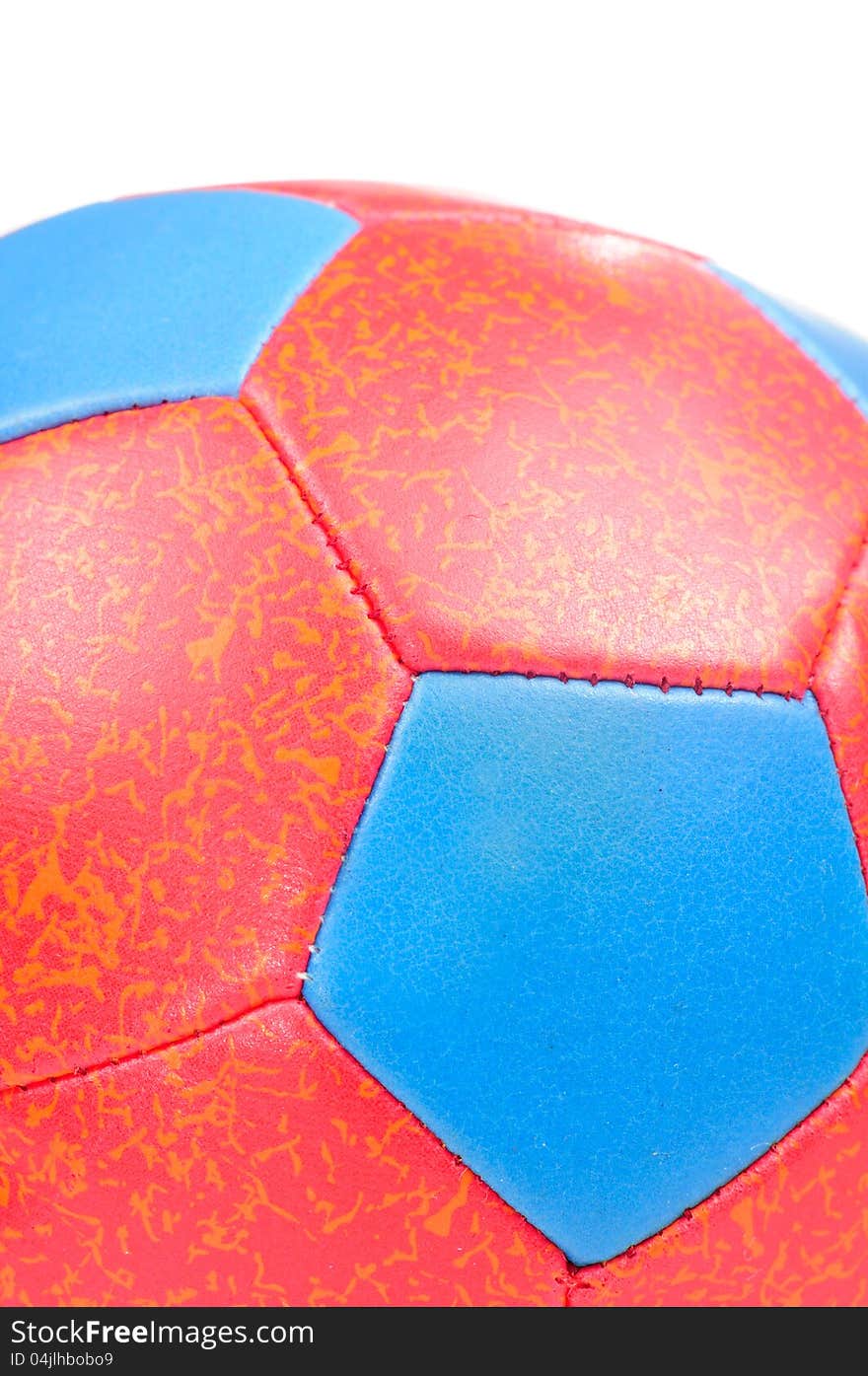 A close-up of a kids’ red and blue ball. A close-up of a kids’ red and blue ball