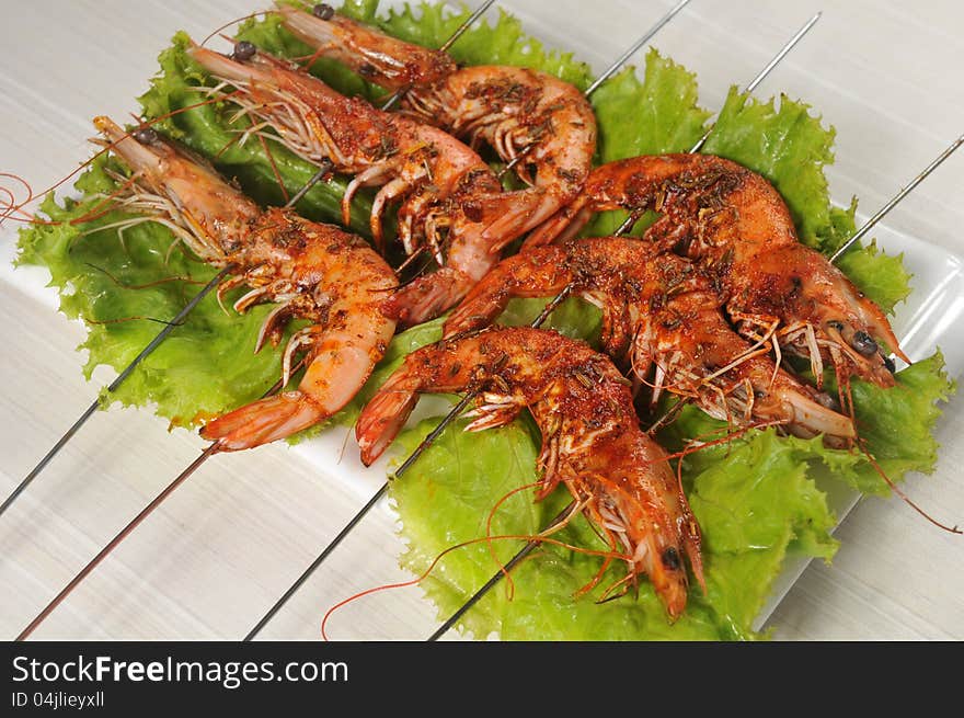 Barbecue; Grilled shrimp on a plate