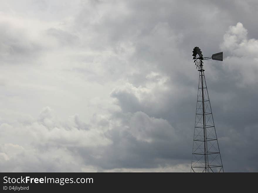 Stormy skies and windmill