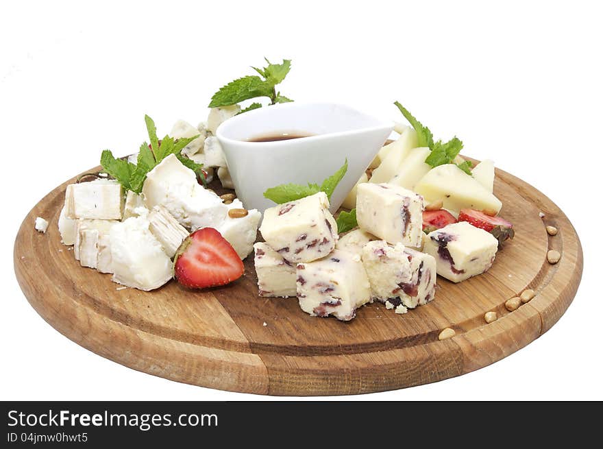 Cheese plate with a large decorated the assortment of mint