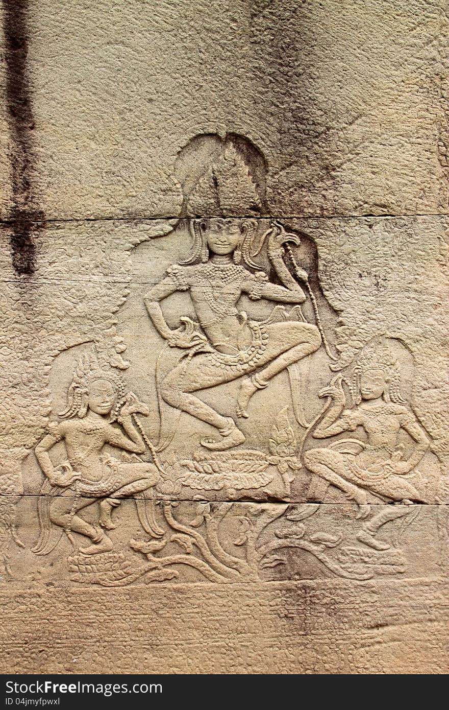 Sandstone carving on wall of Prasat Bayon, Angkor Thom, Siamreap, Khmer Republic. Sandstone carving on wall of Prasat Bayon, Angkor Thom, Siamreap, Khmer Republic