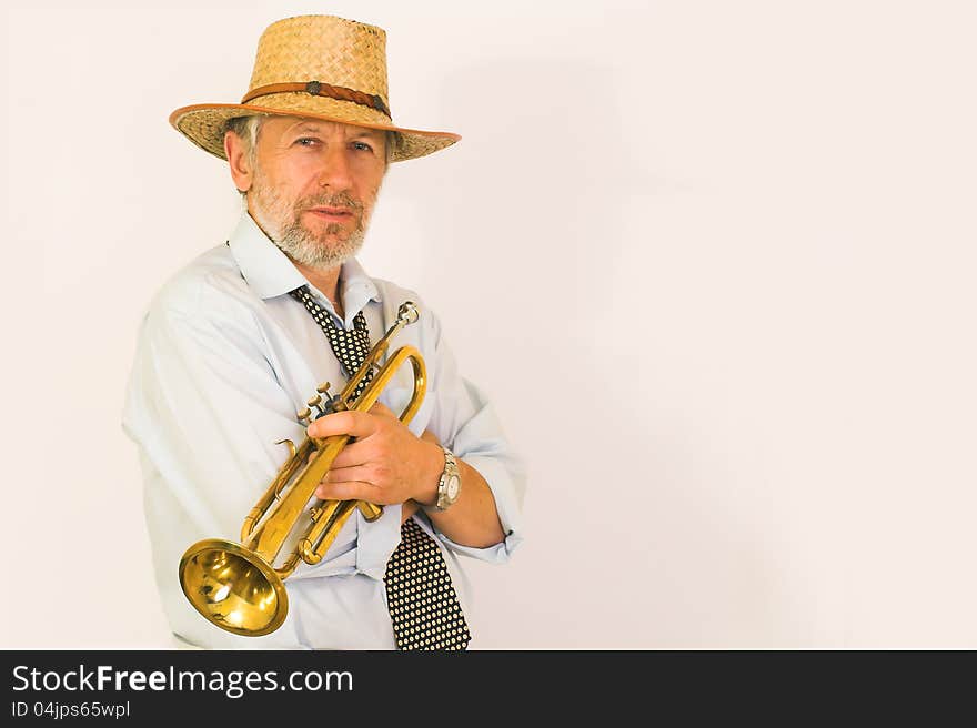 Trumpeter in a straw hut