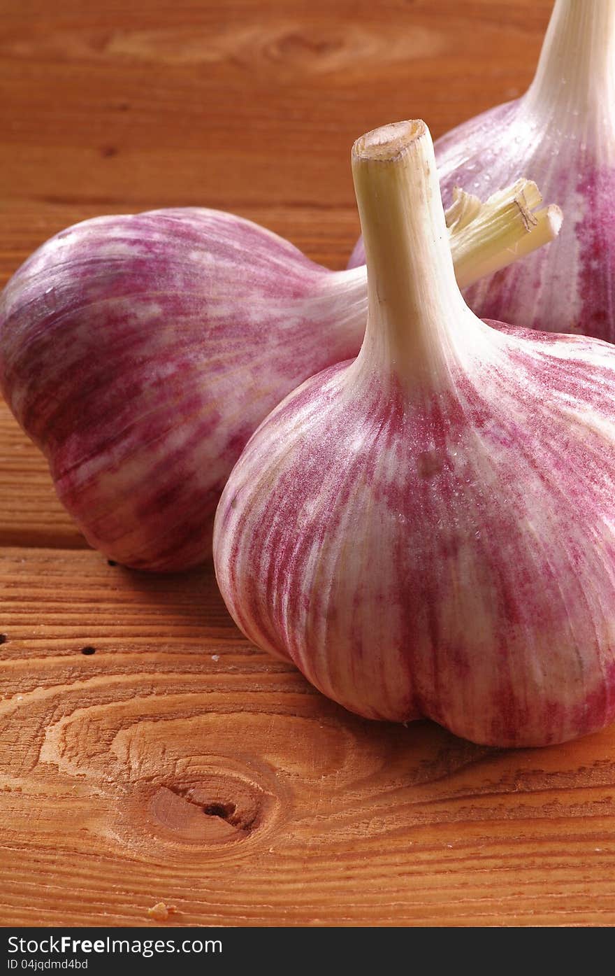 New Harvest Garlic Close up on wooden background