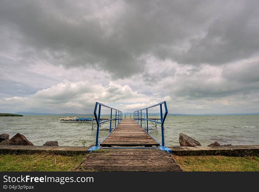 Wooden footbridge at beach of Balaton. Wooden footbridge at beach of Balaton