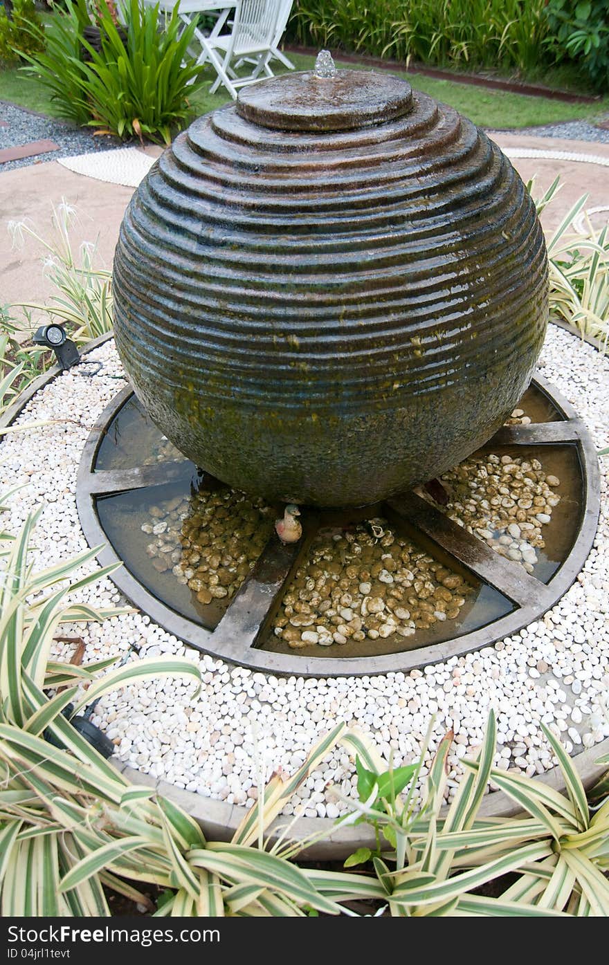 Waterspout Fountain From Thai Earthen  In The Park