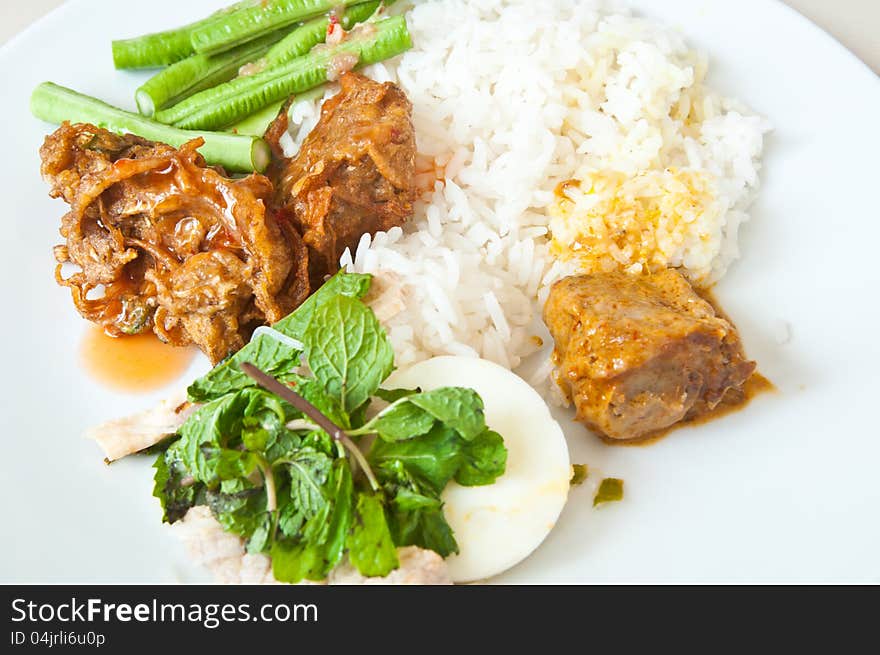 Close up Thai food-rice ,egg ,vegetable and curry