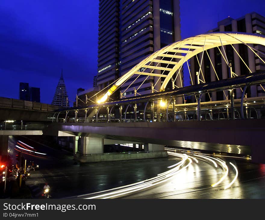 Pubic skywalk with modern buildings of Bangkok downtown square in business zone