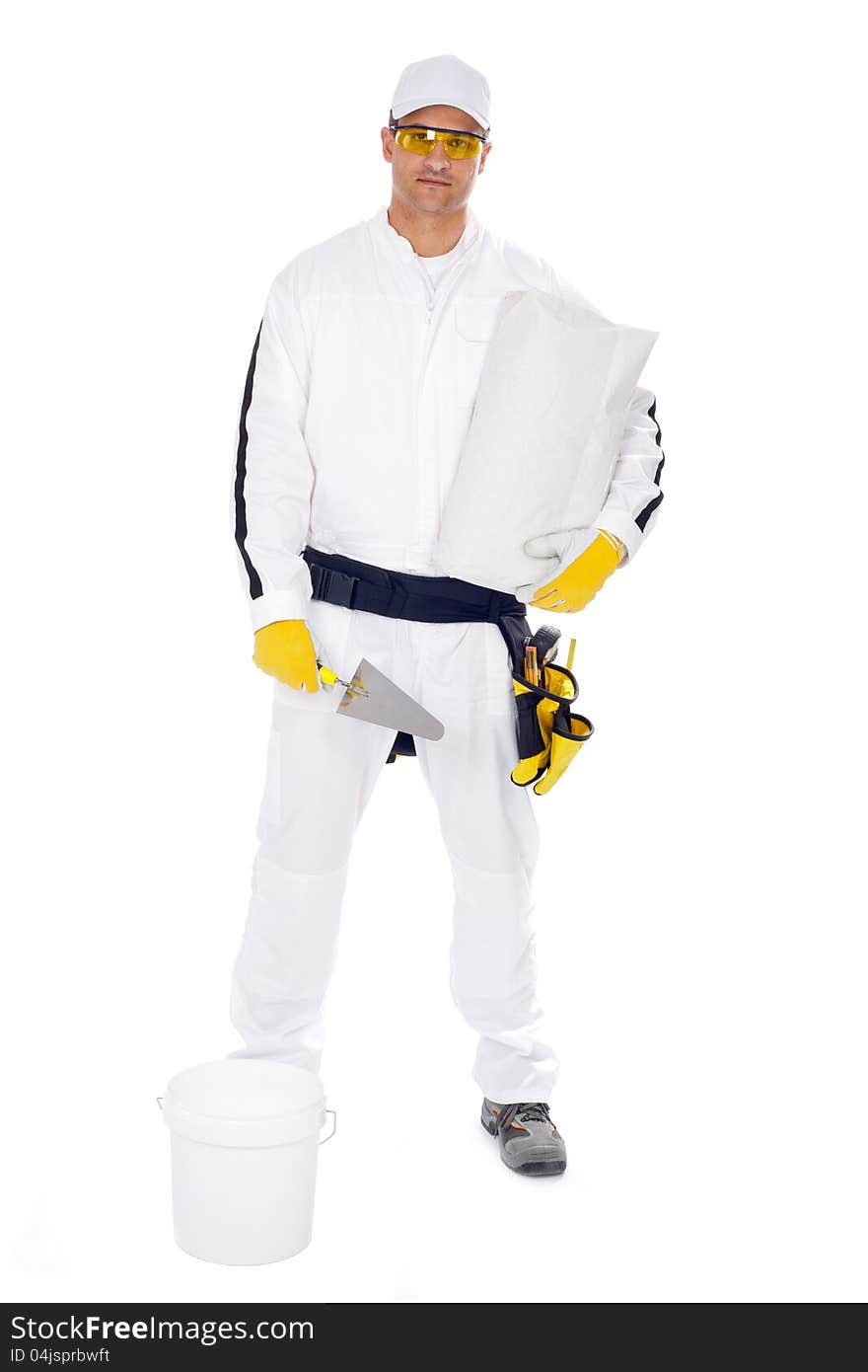 Worker in white overalls holding a bucket trowel tools package on a white background. Worker in white overalls holding a bucket trowel tools package on a white background