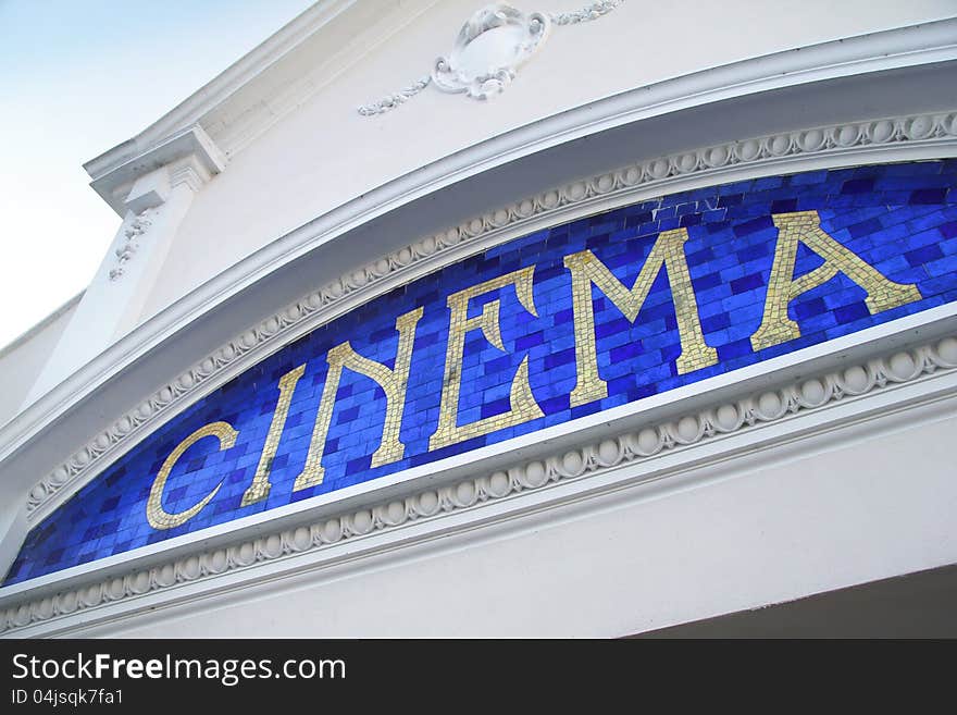 Beautiful mosaic cinema sign in tiles on local picture house. Beautiful mosaic cinema sign in tiles on local picture house