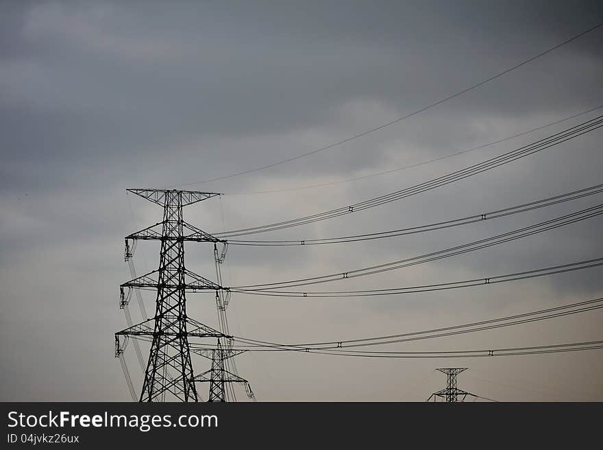 High voltage towers in storm. High voltage towers in storm.