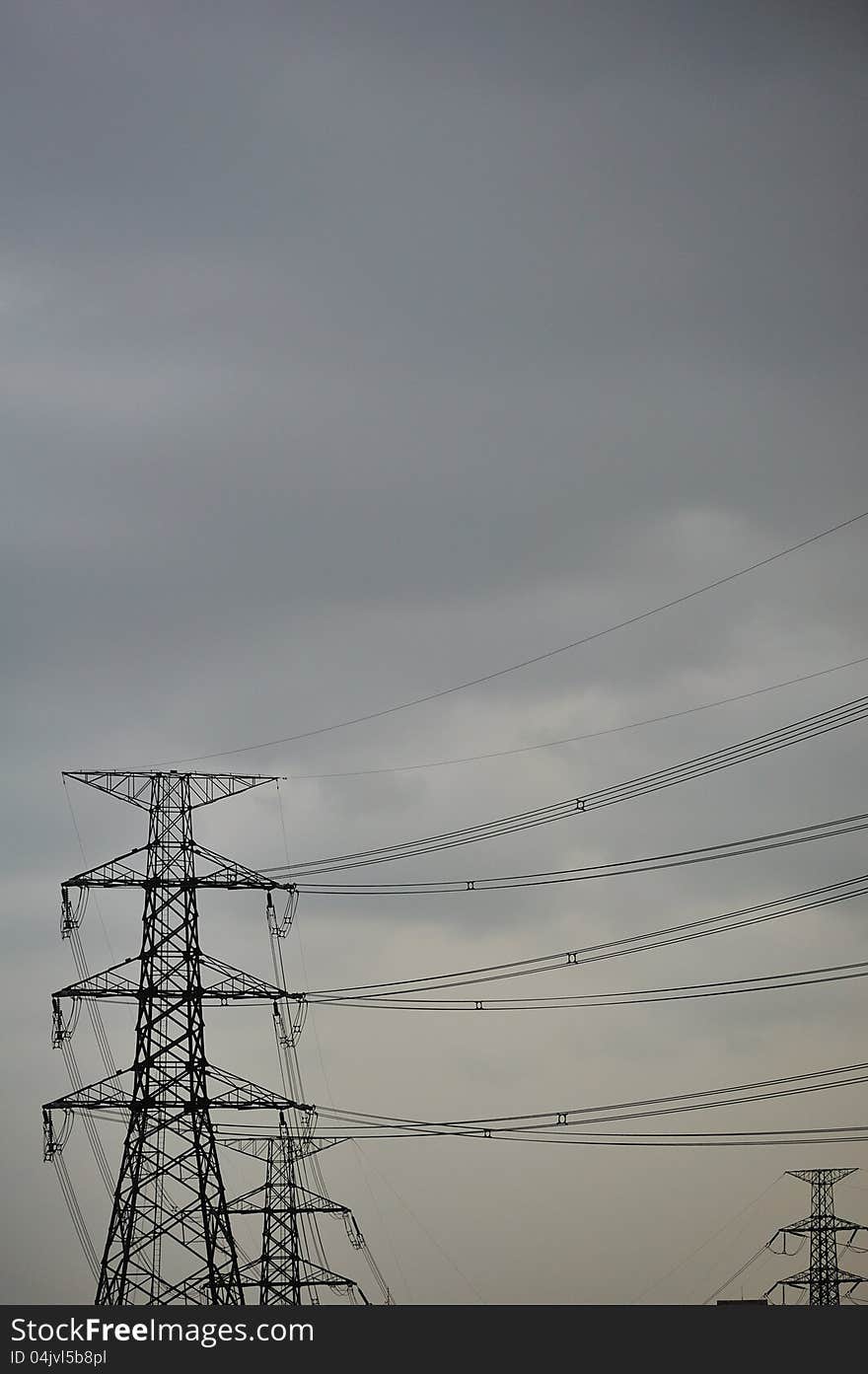 High voltage towers in storm. High voltage towers in storm.