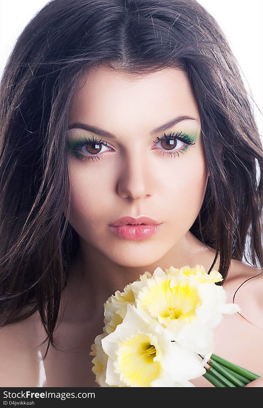 Beauty. Sensual Woman Face With Bouquet Of Flowers