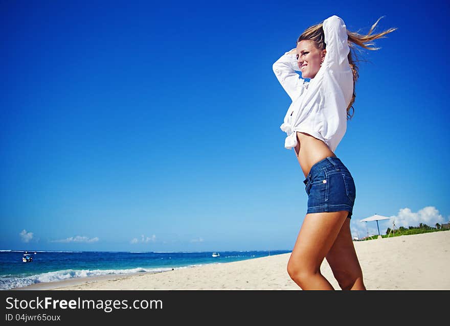 Beautiful tourist woman on summer vacation, beach, bali