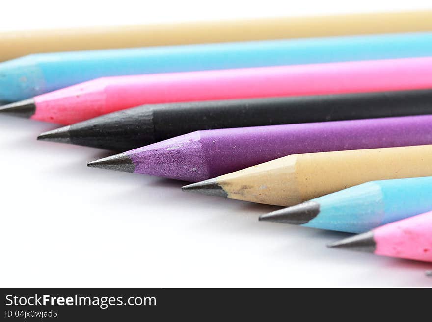 Bright Coloured Pencils Against White Background