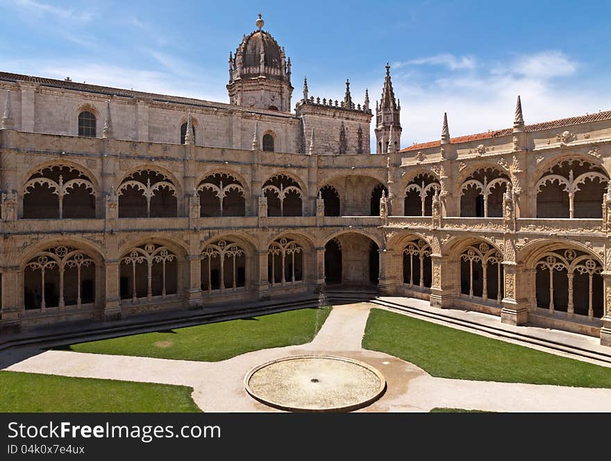 Court with fountain in Jeronimos monastery, Belem. Lisbon, Portugal. Court with fountain in Jeronimos monastery, Belem. Lisbon, Portugal