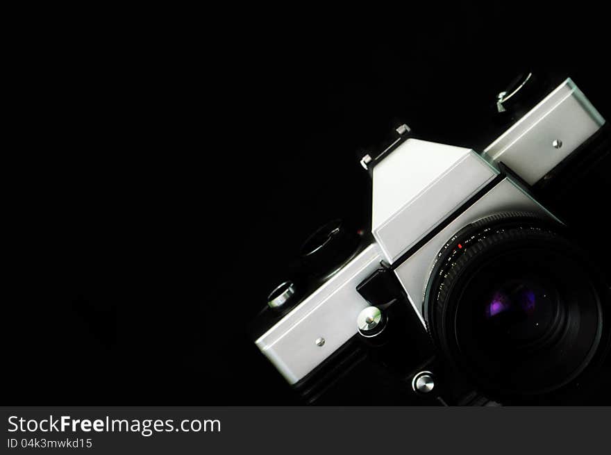 Classic camera frame over black background. Classic camera frame over black background