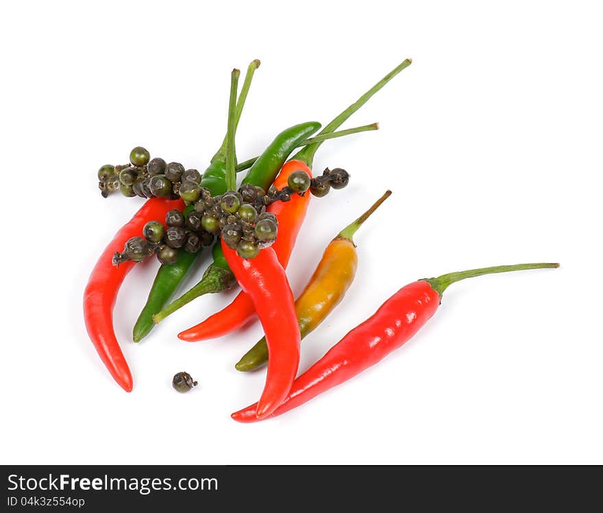 Mini Chili Peppers with pepper peas  on white background