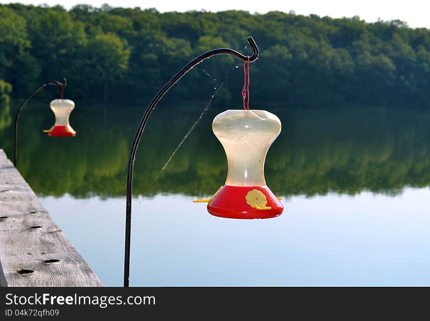 Hummingbird feeds overlook the lake at Beaver Dam State Park in Illinois. Hummingbird feeds overlook the lake at Beaver Dam State Park in Illinois.