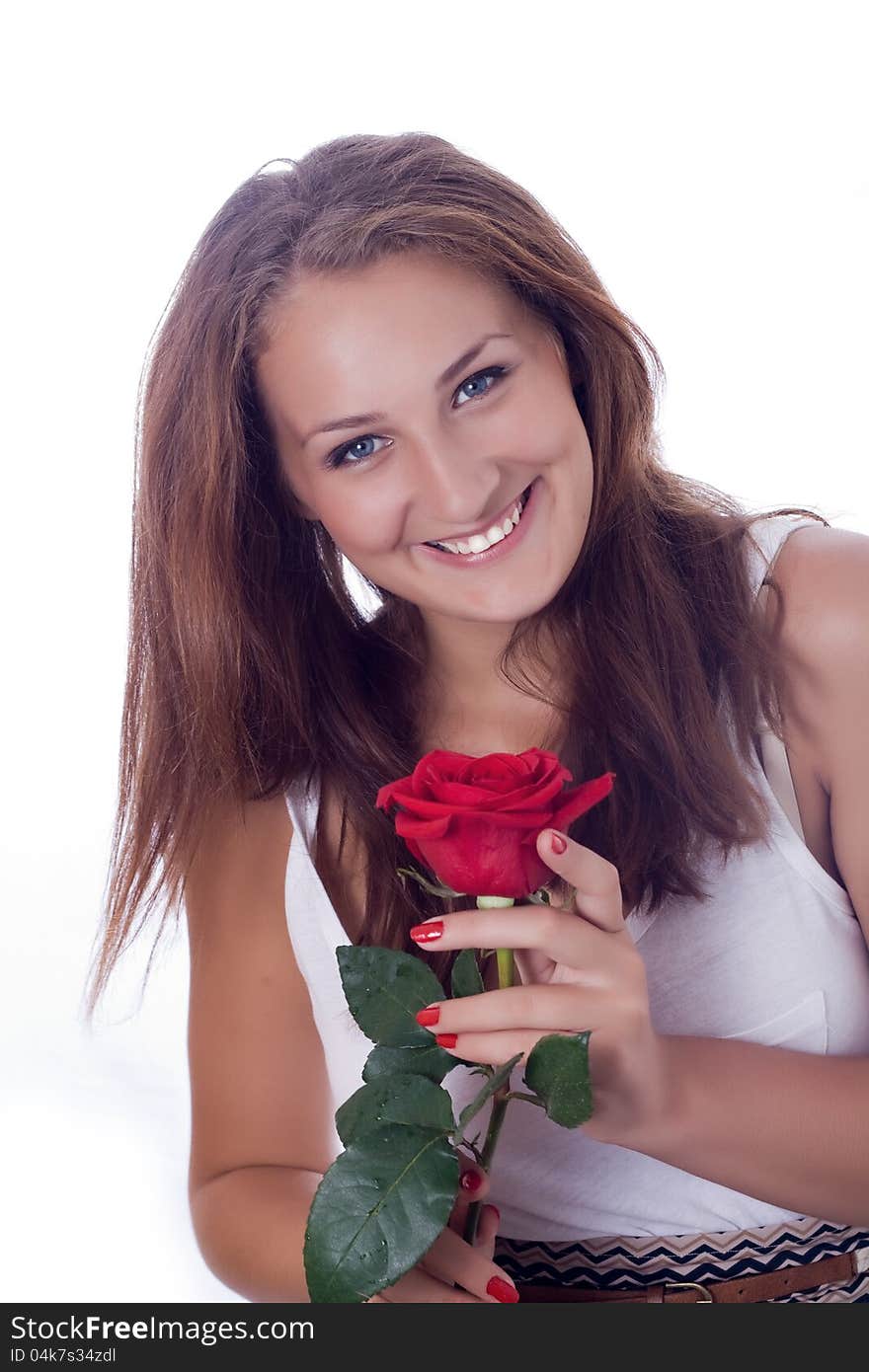 Portrait of attractive caucasian smiling woman isolated on white studio shot with red rose looking at camera. Portrait of attractive caucasian smiling woman isolated on white studio shot with red rose looking at camera