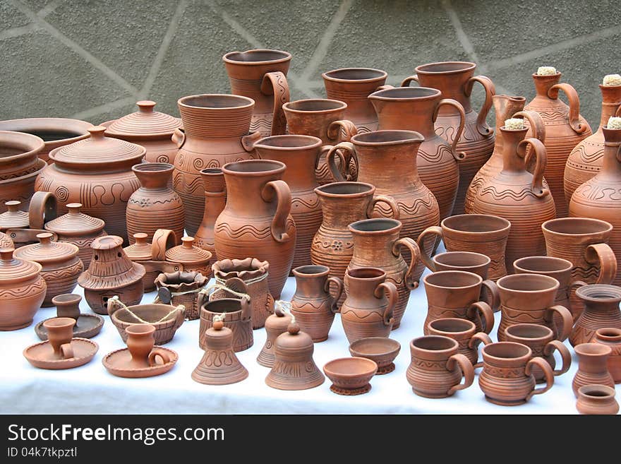 Tableware of handwork is made from red clay. Tableware of handwork is made from red clay